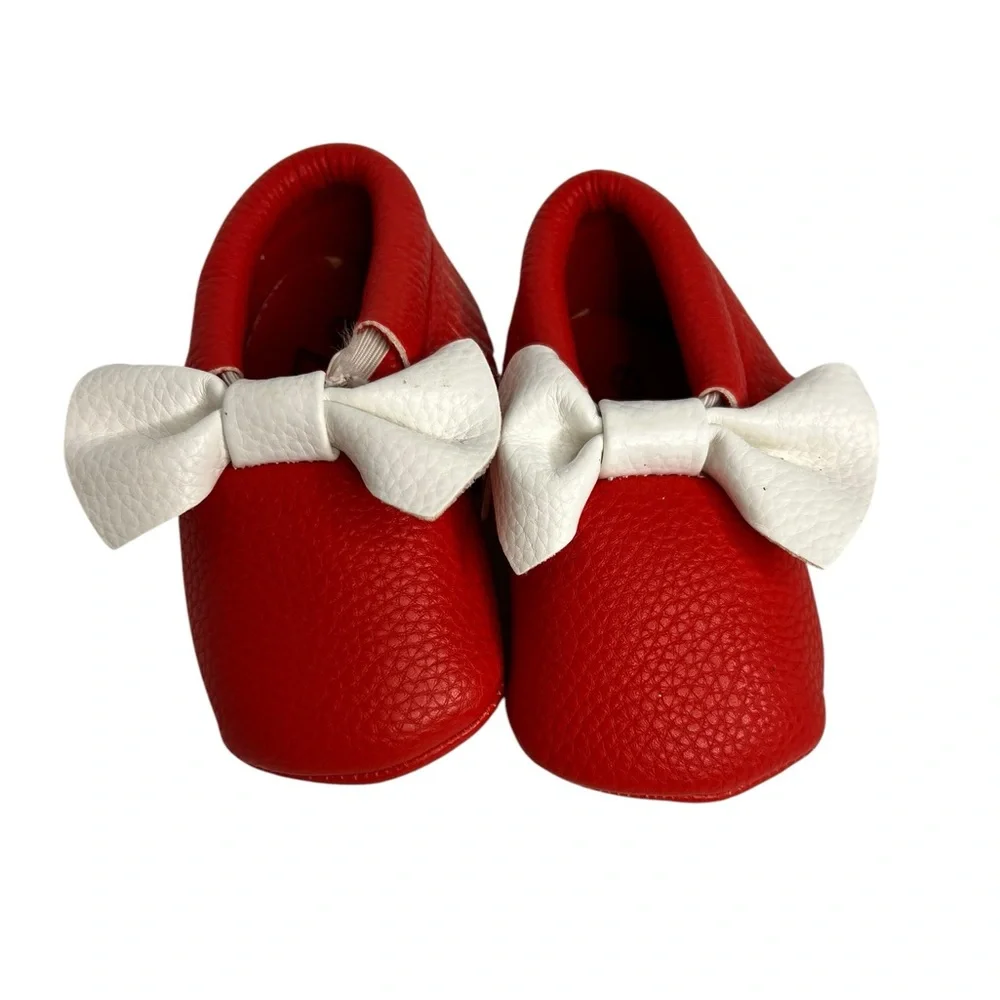 Red Romirus soft sole moccasins W/bow& Fringe